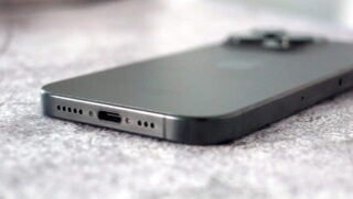 Close-up of an iPhone 15 Pro showing its charging port.
